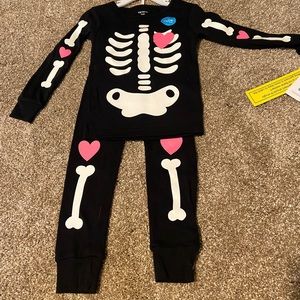 Carter’s glow in the dark two-piece Halloween outfit. New with tags.